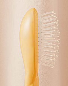 N.04 La Micro Brosse Démêlante & Massante La Miracle Jaune Safran