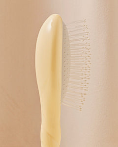 N.04 La Petite Brosse Démêlante & Massante La Miracle Ivoire Cair